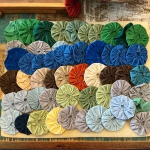 Handmade vintage Fabric Yo-Yo Quilt Pieces, total of 50!